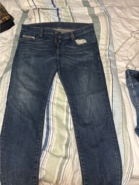 Men’s Diesel tapered slim fit medium wash jeans